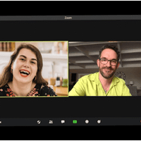 Etienne meeting with a smiling client on videoconference